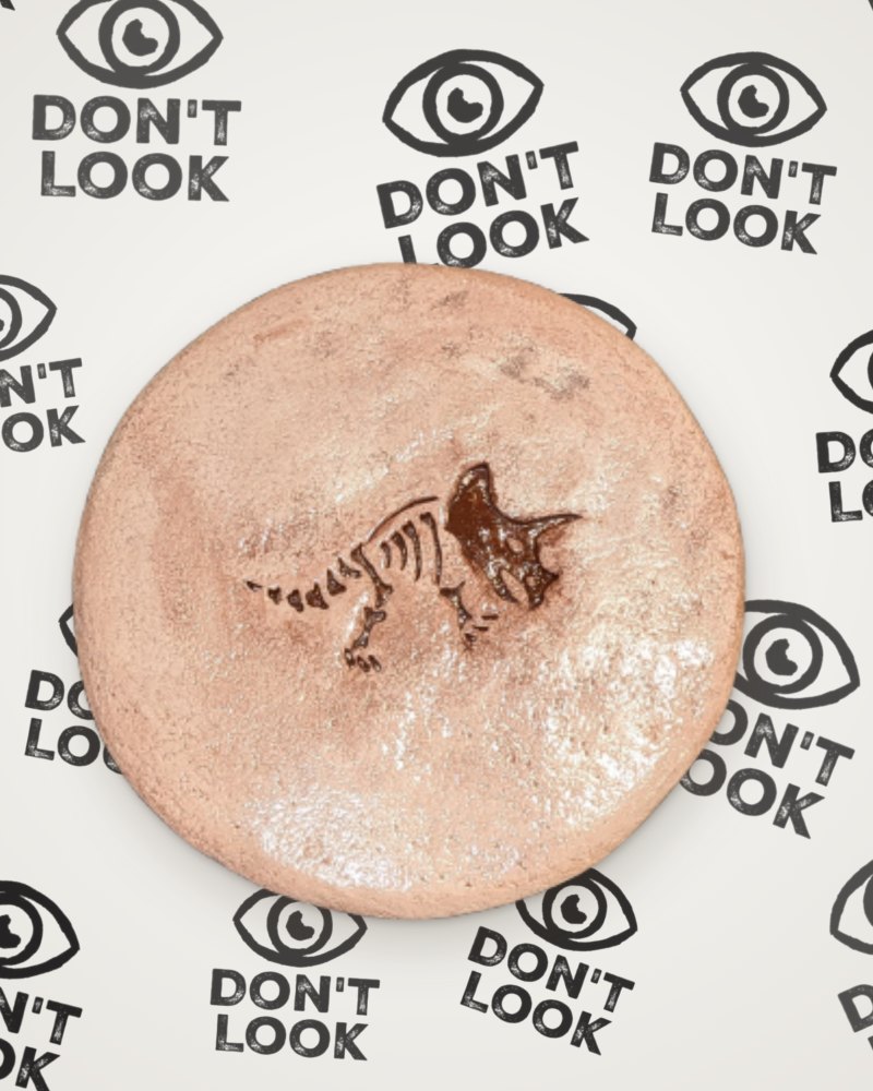 Triceratops coaster in brown