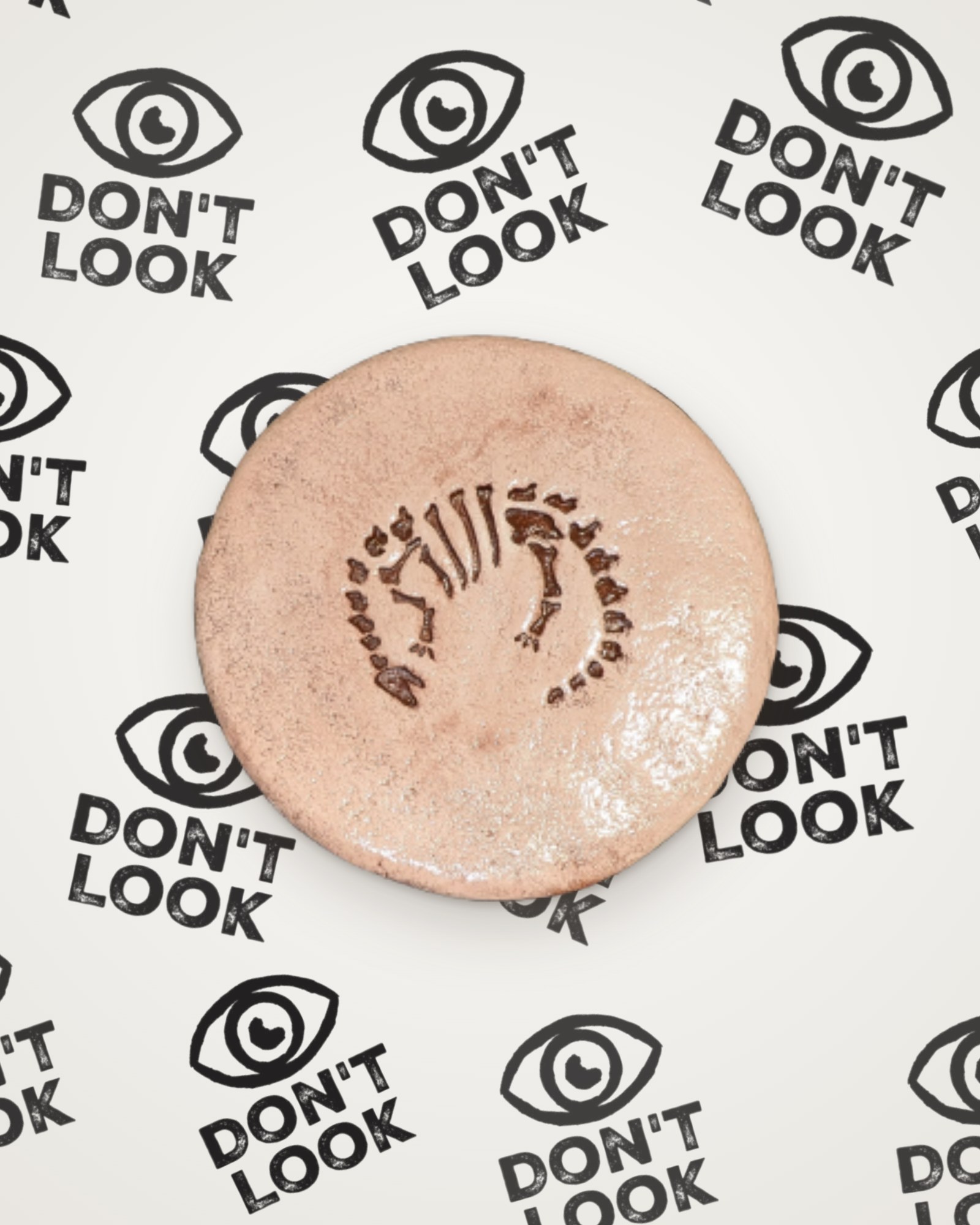 Diplodocus fossil coaster in brown
