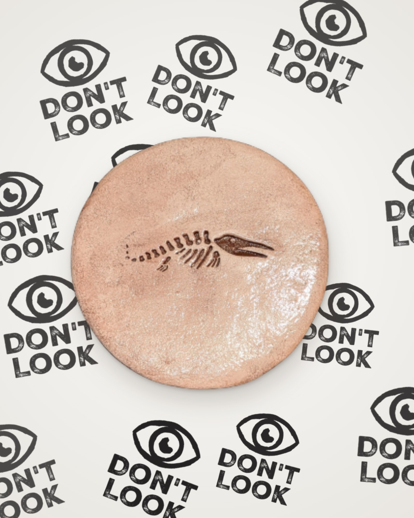 Plesiosaur fossil coaster in brown