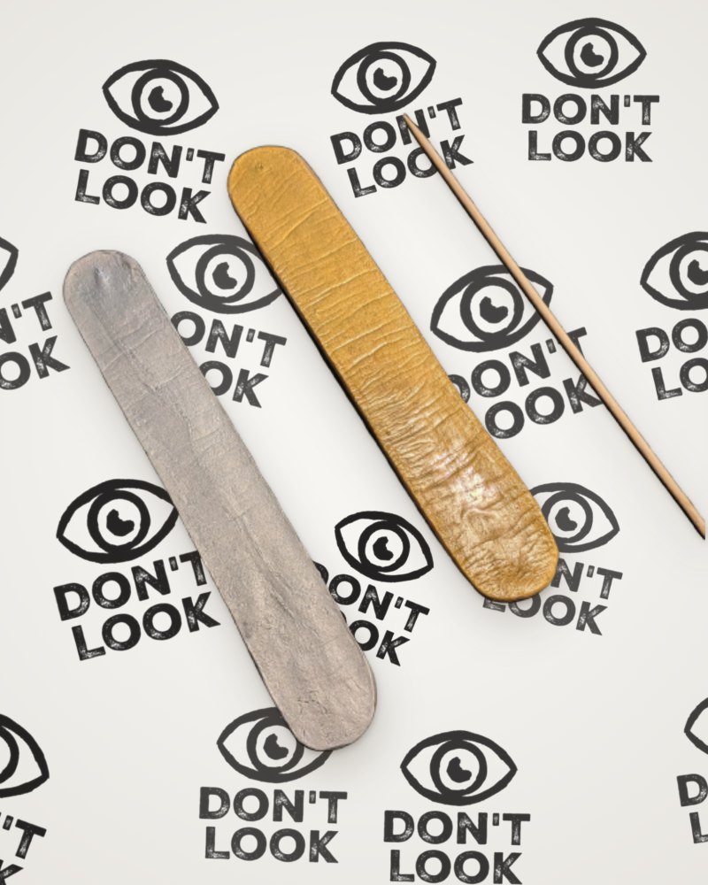 Backs of incense stick holders in gold and silver