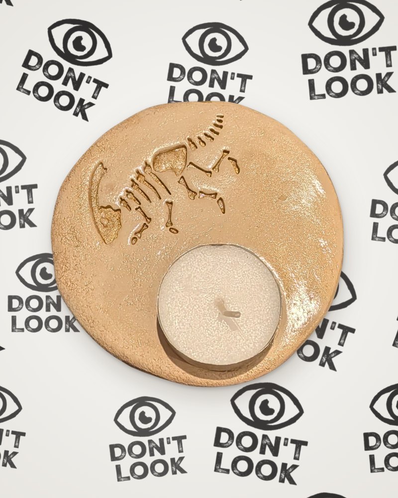 Parasaurolophus tealight holder in gold