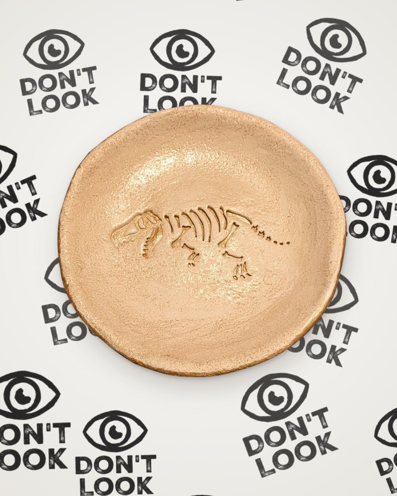 T-Rex fossil trinket dish gold